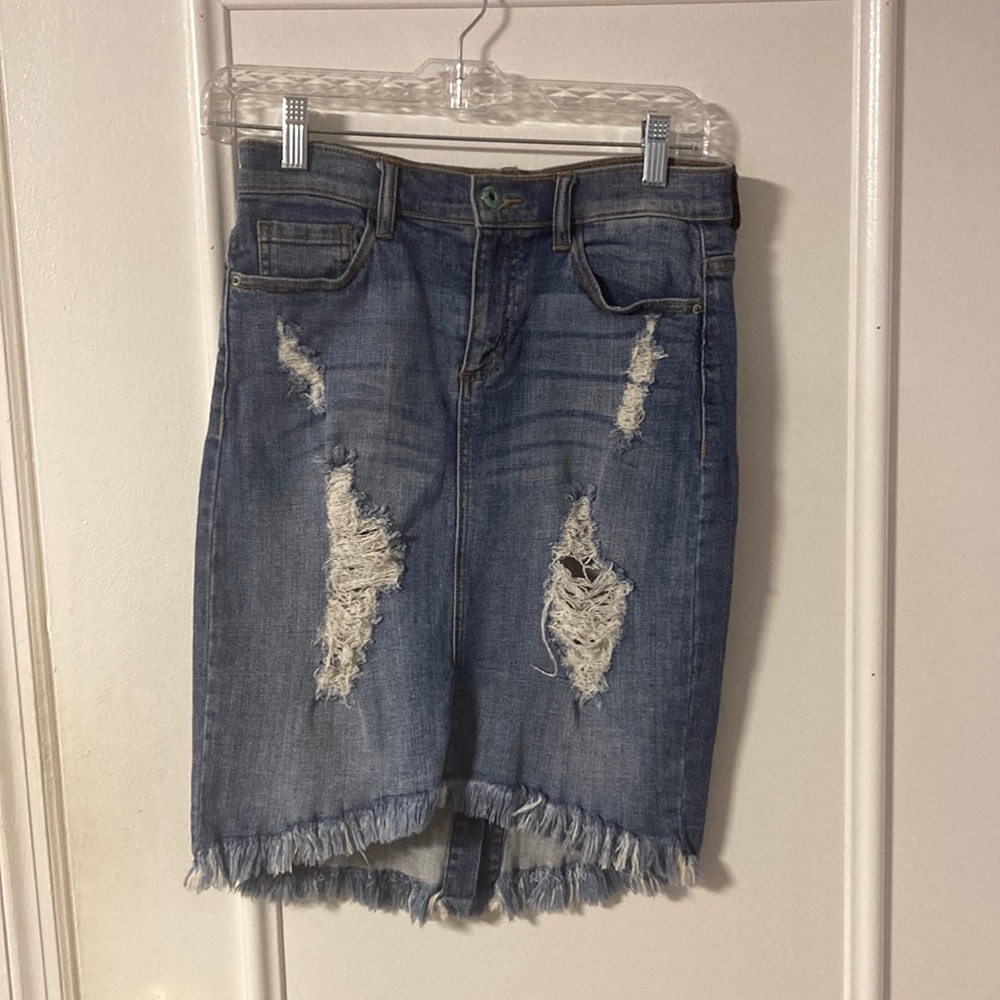 Blue denim skirt with rips